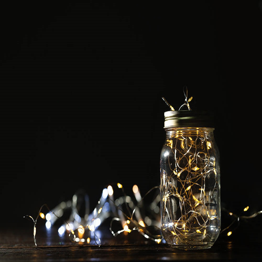 Fairy light in a glass jar. Christmas/Happy new year decoration
